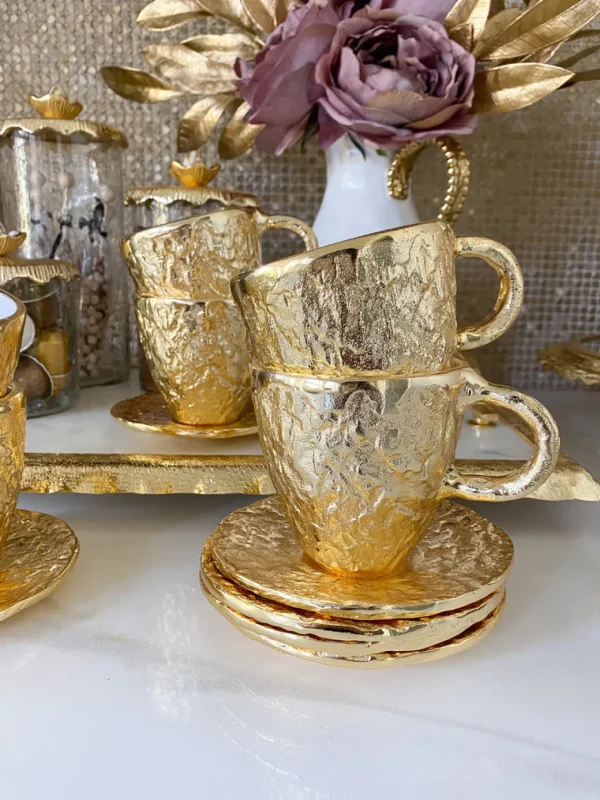 Inspire Me! Home Decor Gold Textured Metal Tea Cup And Saucer With White Interior