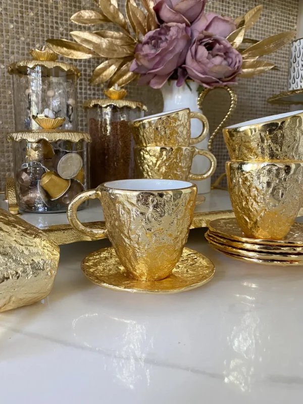 Inspire Me! Home Decor Gold Textured Metal Tea Cup And Saucer With White Interior